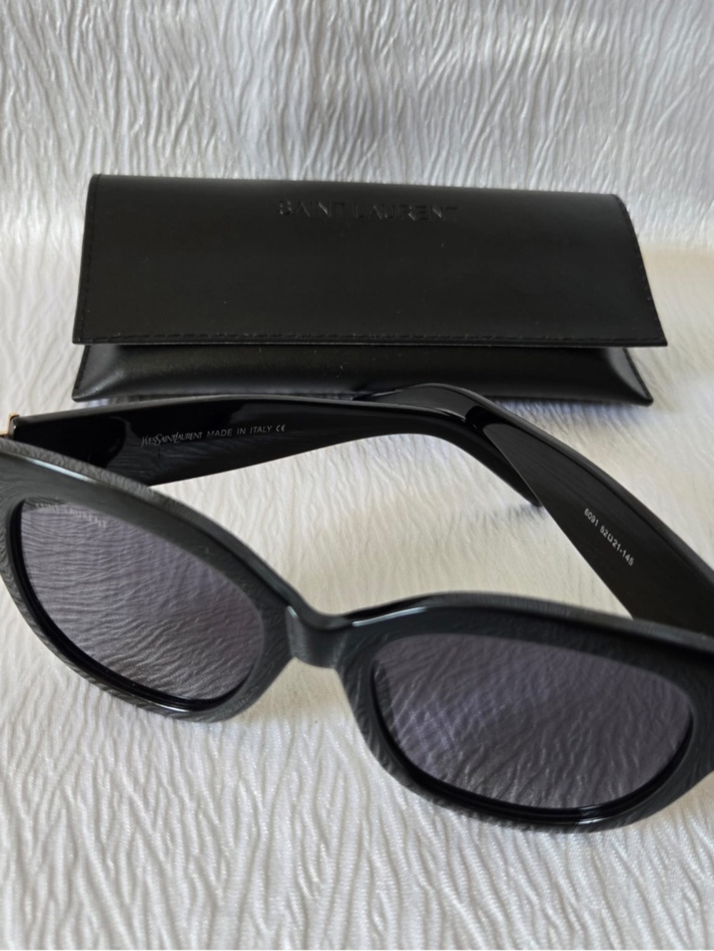 Saint Laurent Black Oval Sunglasses with Dark Lenses